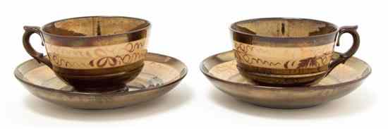 Appraisal: A Set of Copper Lustreware Cups and Saucers each decorated