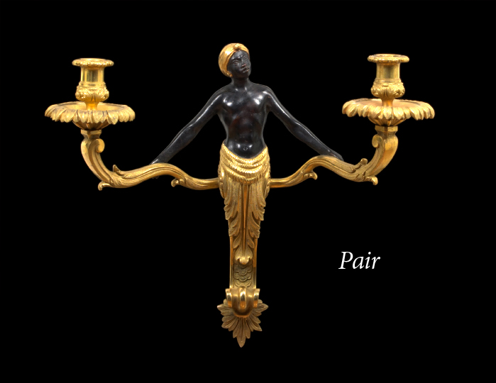 Appraisal: Pair of French Parcel-Ebonized and Gilt-Lacquered Brass Blackamoor Terme Appliques