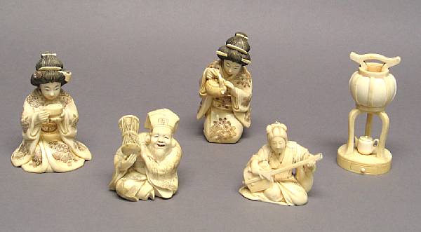 Appraisal: A group of five Japanese ivory carvings th Century Including