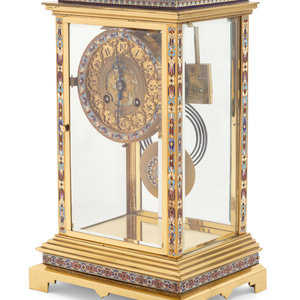 Appraisal: A French Gilt Brass and Champlev Mantel Clock Retailed by