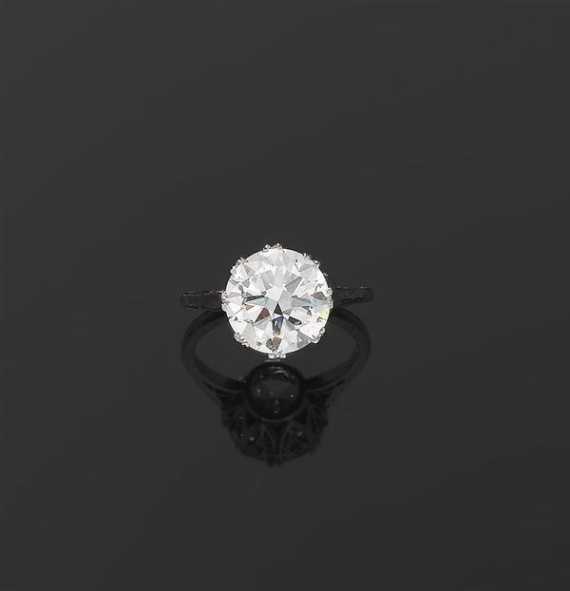 Appraisal: BRILLIANT-CUT DIAMOND RING Switzerland ca Platinum Elegant solitaire model set