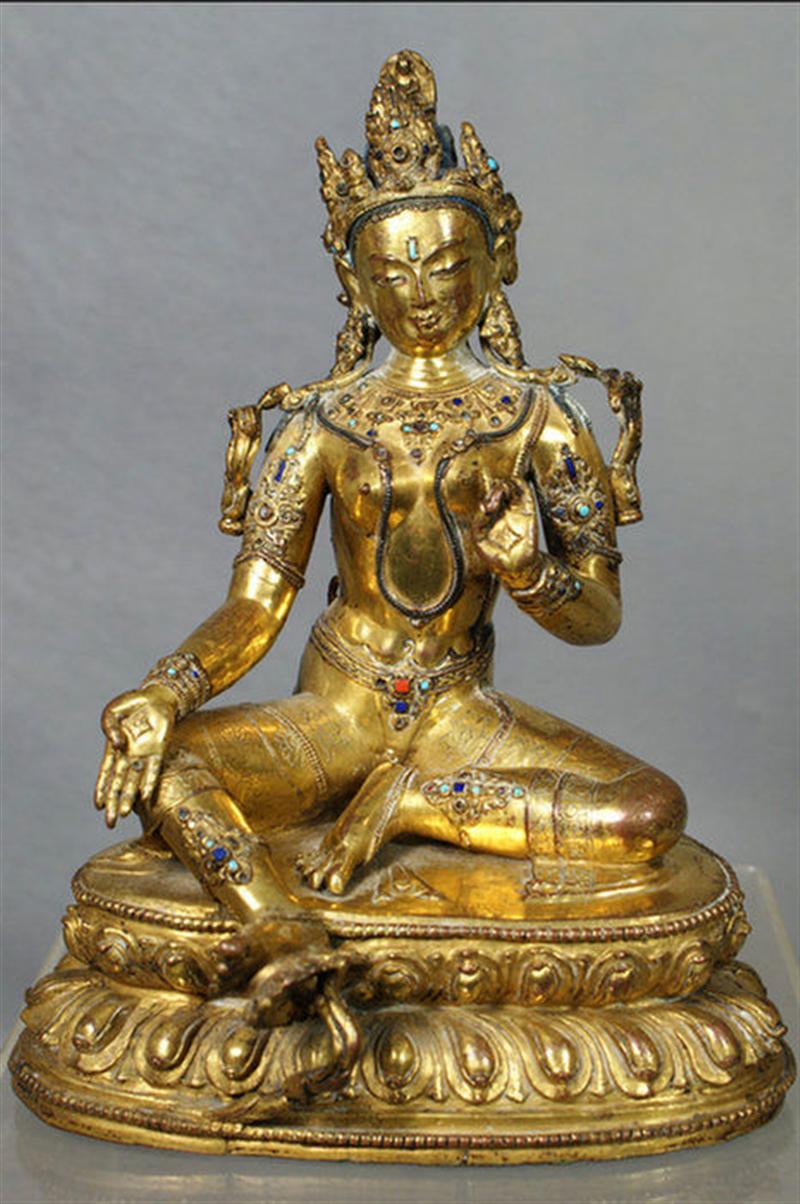 Appraisal: Cast bronze seated Asian figure of Parvati set with turquoise