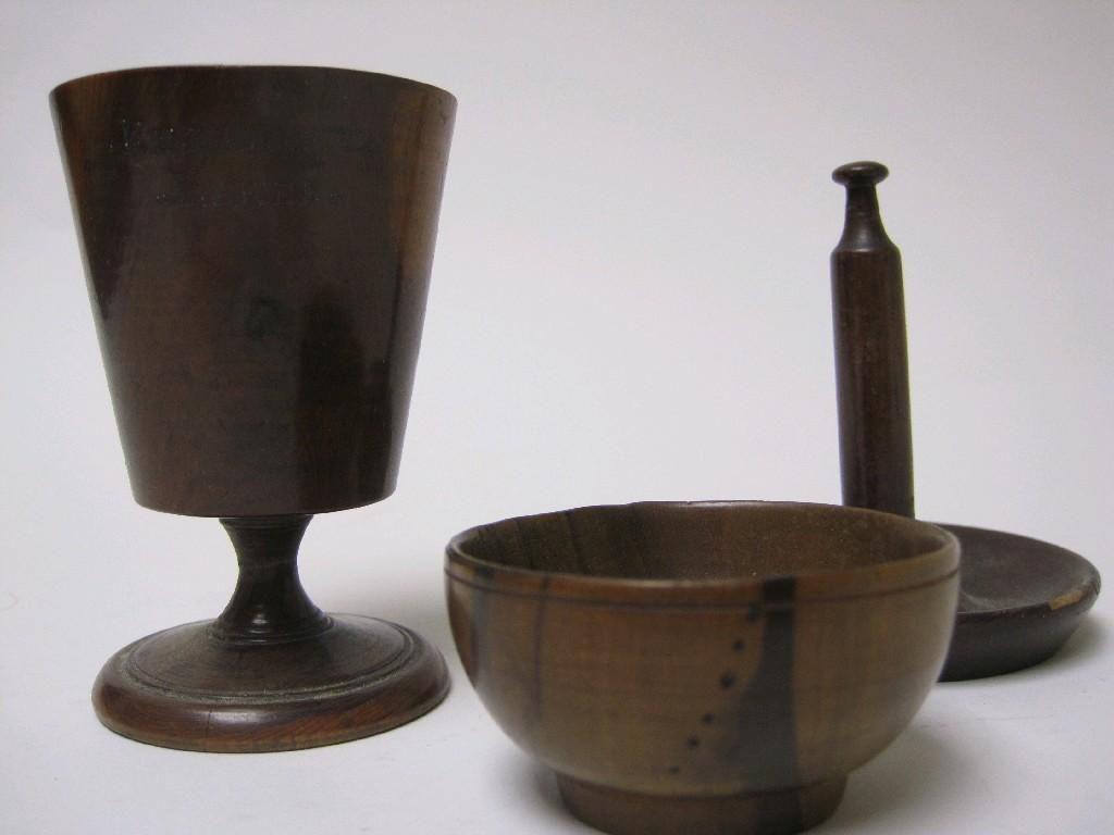 Appraisal: A small lignum vitae treen Goblet marked Killarney Lakes in