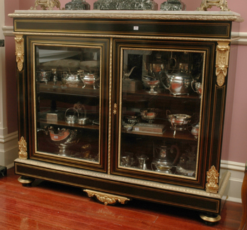 Appraisal: A VICTORIAN GILT METAL MOUNTED EBONISED DISPLAY CABINET The rectangular