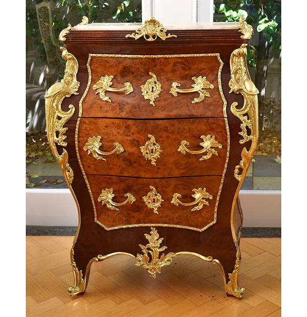 Appraisal: A GILT METAL MOUNTED MAHOGANY AND AMBOYNA MARBLE TOP COMMODE