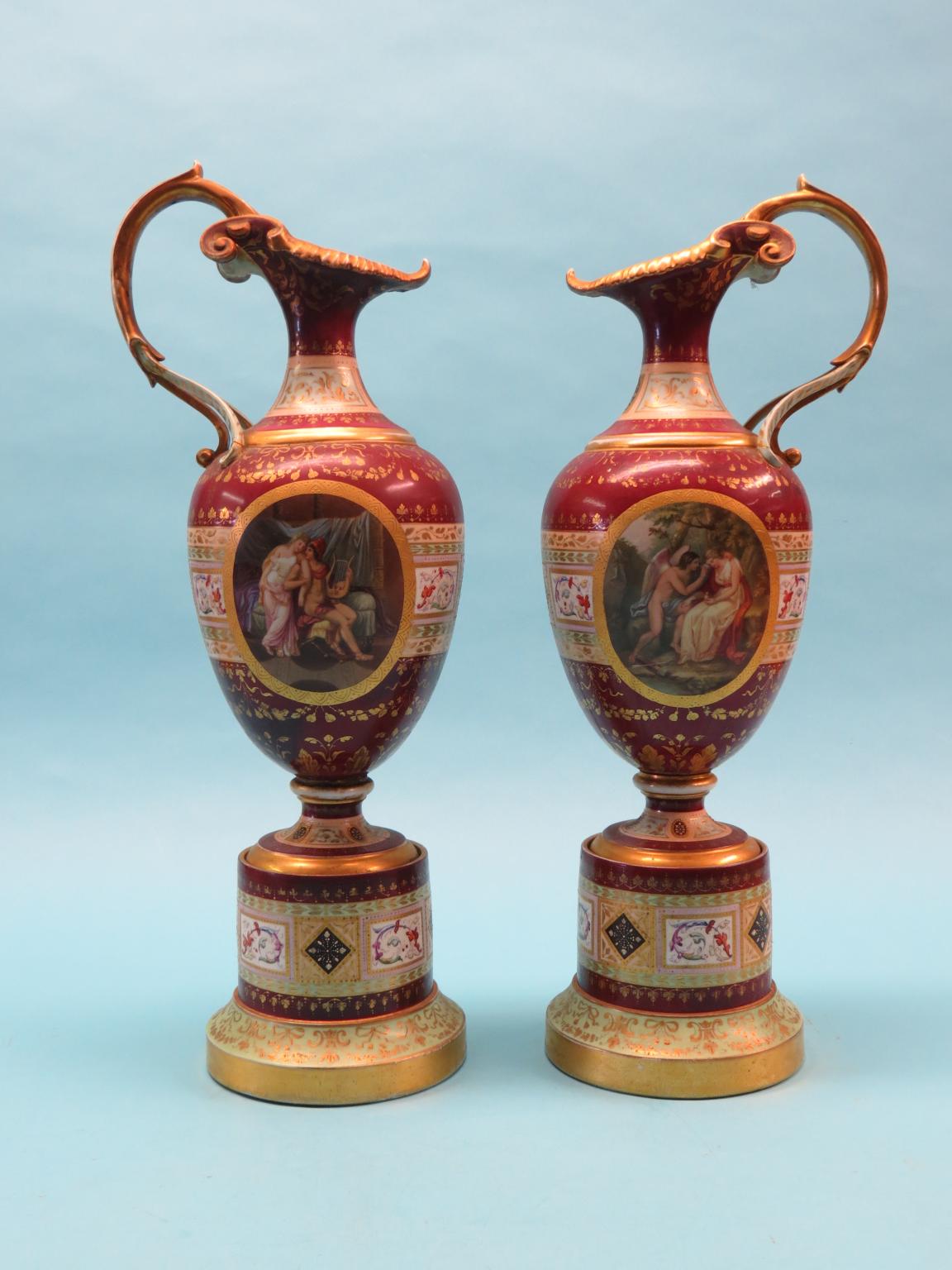 Appraisal: A large pair of th century Vienna-type porcelain ewers each