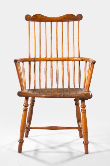 Appraisal: Early Elmwood Windsor Armchair early th century the single-board plank