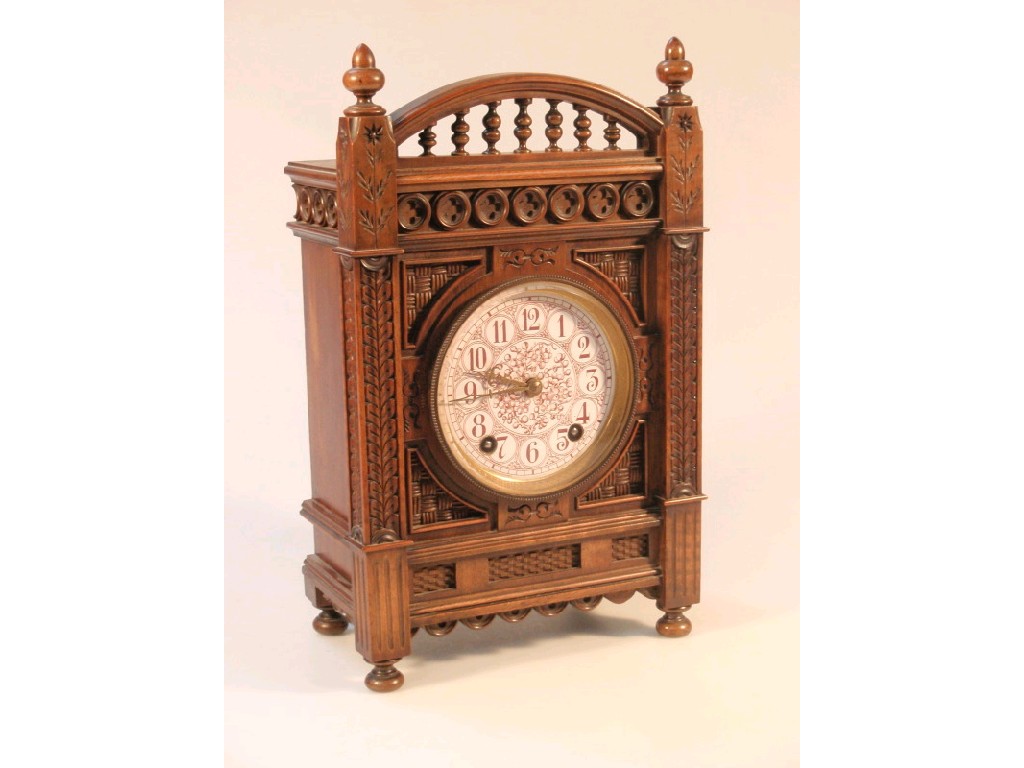 Appraisal: A late Victorian Aesthetic movement mantel clock with eight day