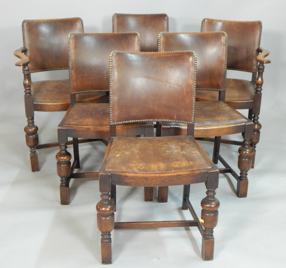 Appraisal: A set of six oak dining chairs each upholstered in