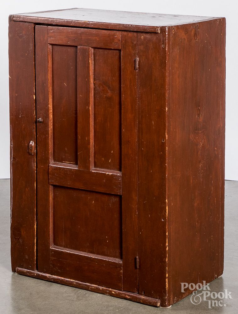 Appraisal: Stained pine hanging cupboard th c Stained pine hanging cupboard