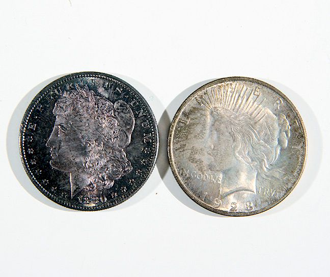 Appraisal: Silver Dollars Two uncirculated silver dollars and s Condition Please