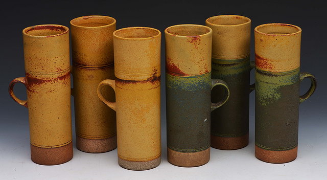 Appraisal: Robin Welch British b Set of six mugs cylindrical form