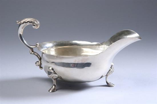 Appraisal: GEORGE III-STYLE STERLING SILVER SAUCE BOAT marked Sterling Hand Made