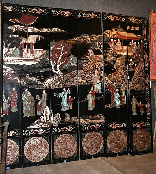 Appraisal: A large eight-panel coromandel screen th Century Depicting figures in