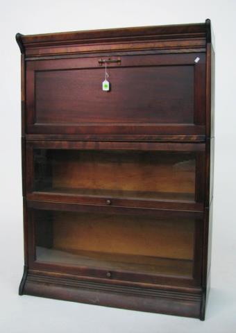 Appraisal: A mahogany three stack desk bookcase with upper section being