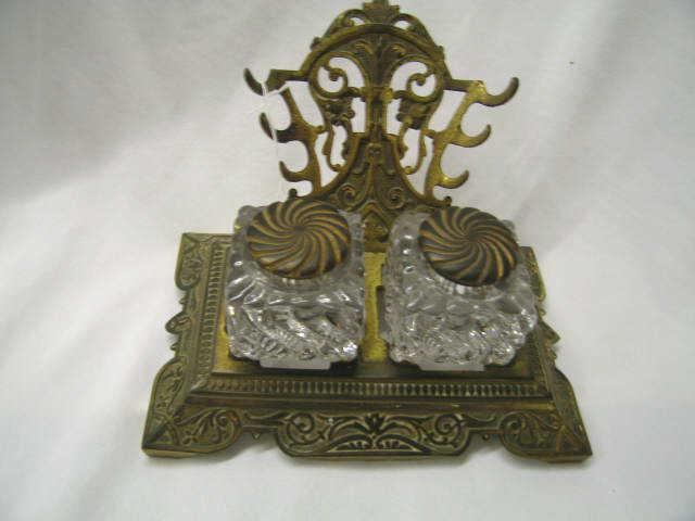 Appraisal: Victorian Bronzed Inkstand double well swirling glass inserts