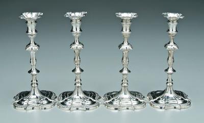 Appraisal: Four silver candlesticks assembled set matching design with shaped square