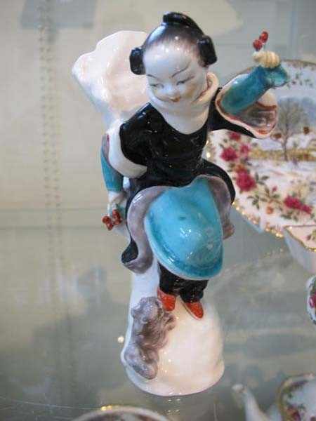 Appraisal: ROYAL WORCESTER CHINOISERIE FIGURE