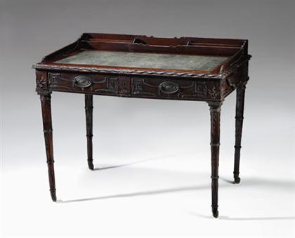 Appraisal: Mahogany writing desk early part of th century Carved with