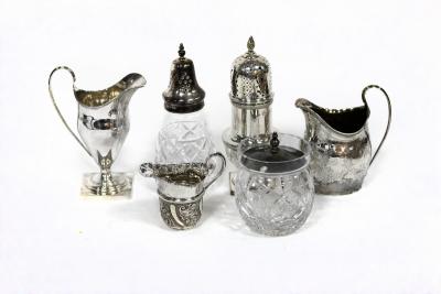 Appraisal: A George III silver cream jug London of helmet shape