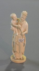 Appraisal: A carved Chinese ivory figure of a standing QuinYan holding