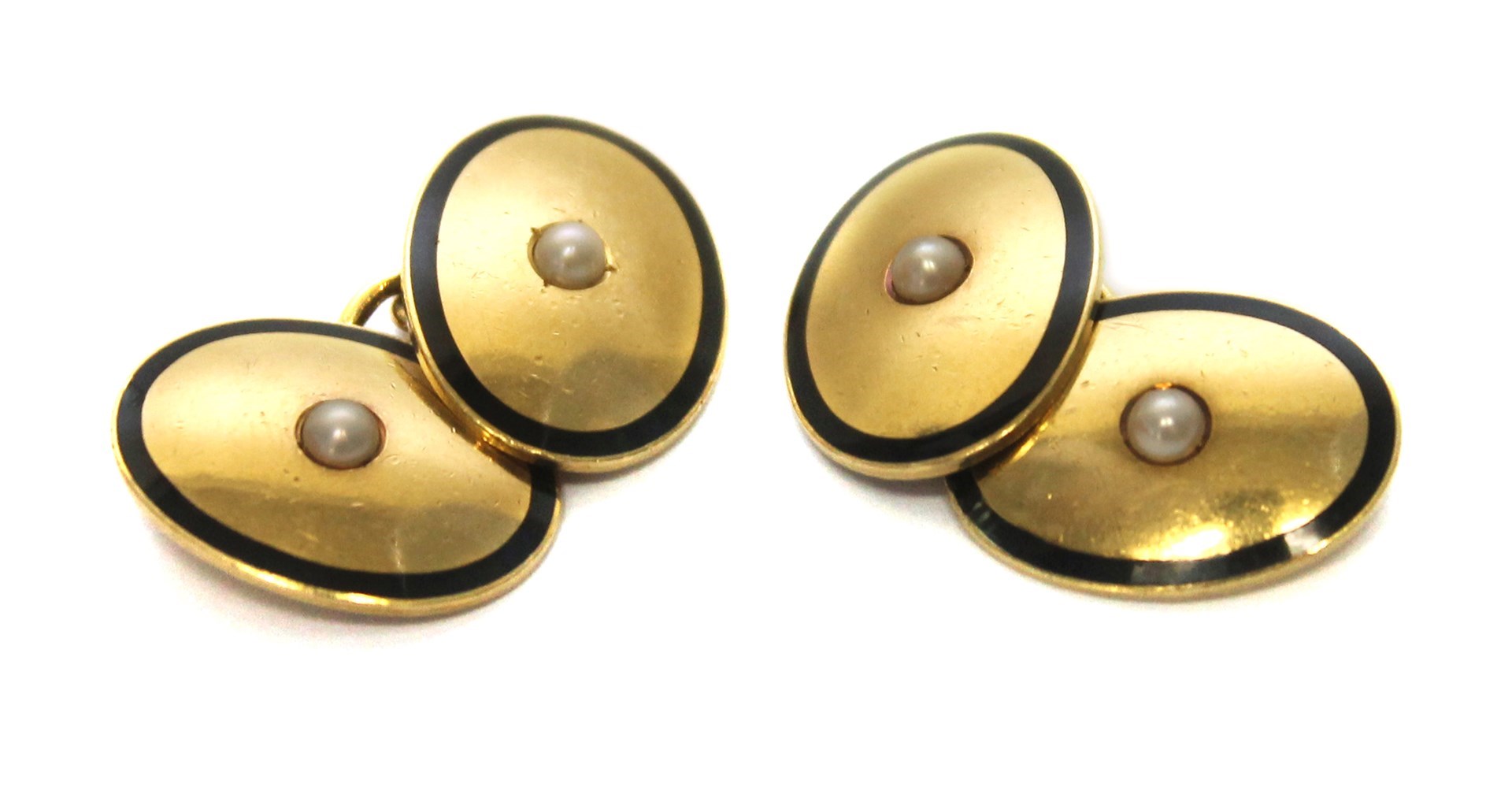 Appraisal: A pair of gold half pearl set and black enameled