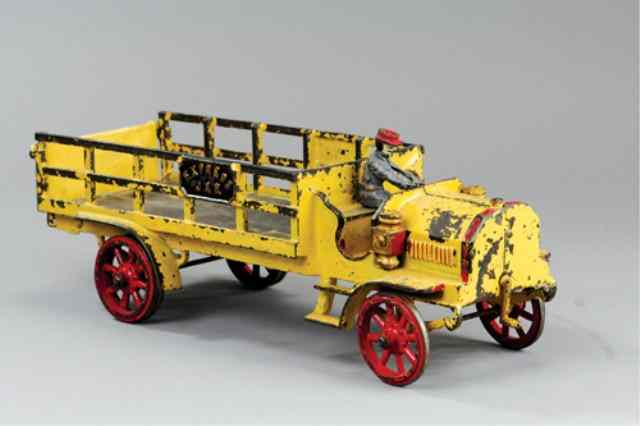 Appraisal: EARLY JONES AND BIXLER ''EXPRESS'' STAKE TRUCK WITH Cast iron