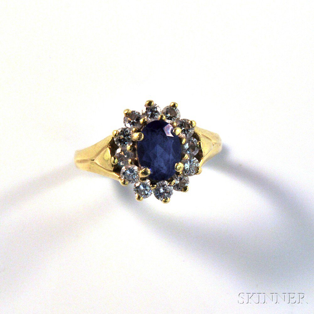 Appraisal: kt Gold Tanzanite and Diamond Ring the small oval-cut stone