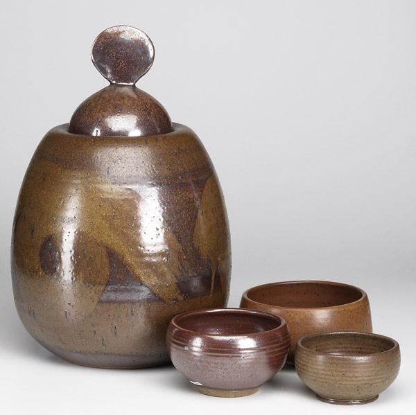 Appraisal: VAL CUSHING Four stoneware pieces three bowls and a coverd