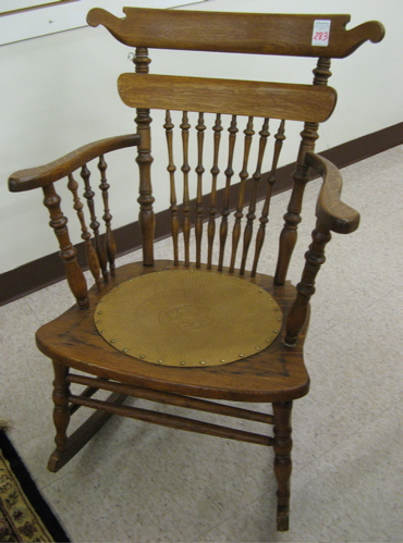 Appraisal: LATE VICTORIAN OAK ROCKING ARMCHAIR American late th century having