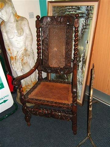 Appraisal: An antique Jacobean mahogany Carolean style open armchair with caned