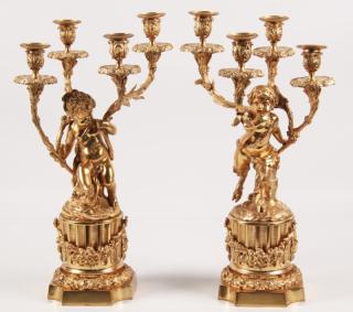 Appraisal: PAIR OF FRENCH DORE BRONZE LIGHT CANDELABRA HAVING MYTHOLOGICAL PUTTI