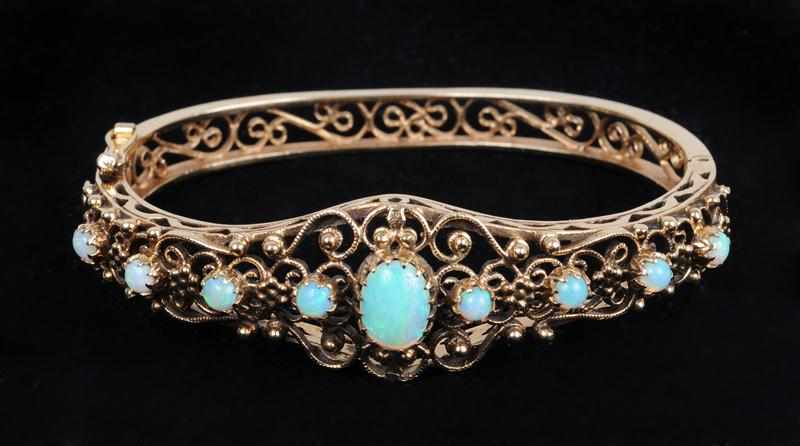 Appraisal: OPAL AND GOLD FILIGREE BRACELET Indistinctly stamped