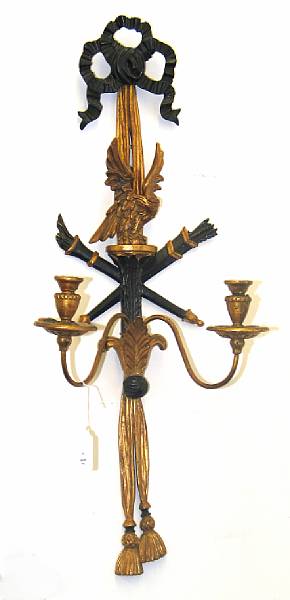 Appraisal: An Italian Neoclassical style partially ebonized and giltwood two light