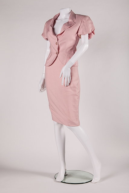 Appraisal: A pale pink Christian Dior linen skirt suit comprising of