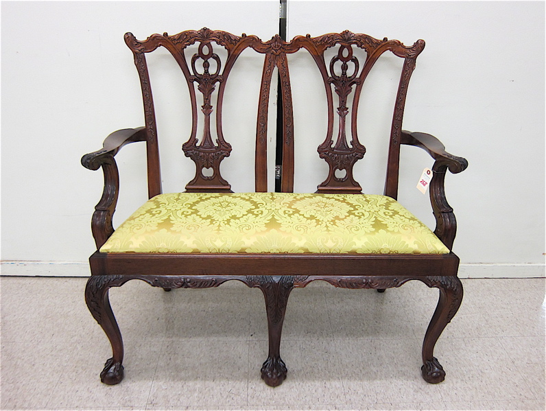 Appraisal: CHIPPENDALE STYLE DOUBLE CHAIR-BACK SETTEE American th century having a