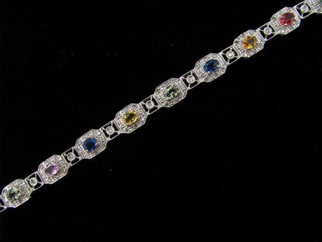 Appraisal: K white gold bracelet with diamonds and multi-colored semi-precious stones