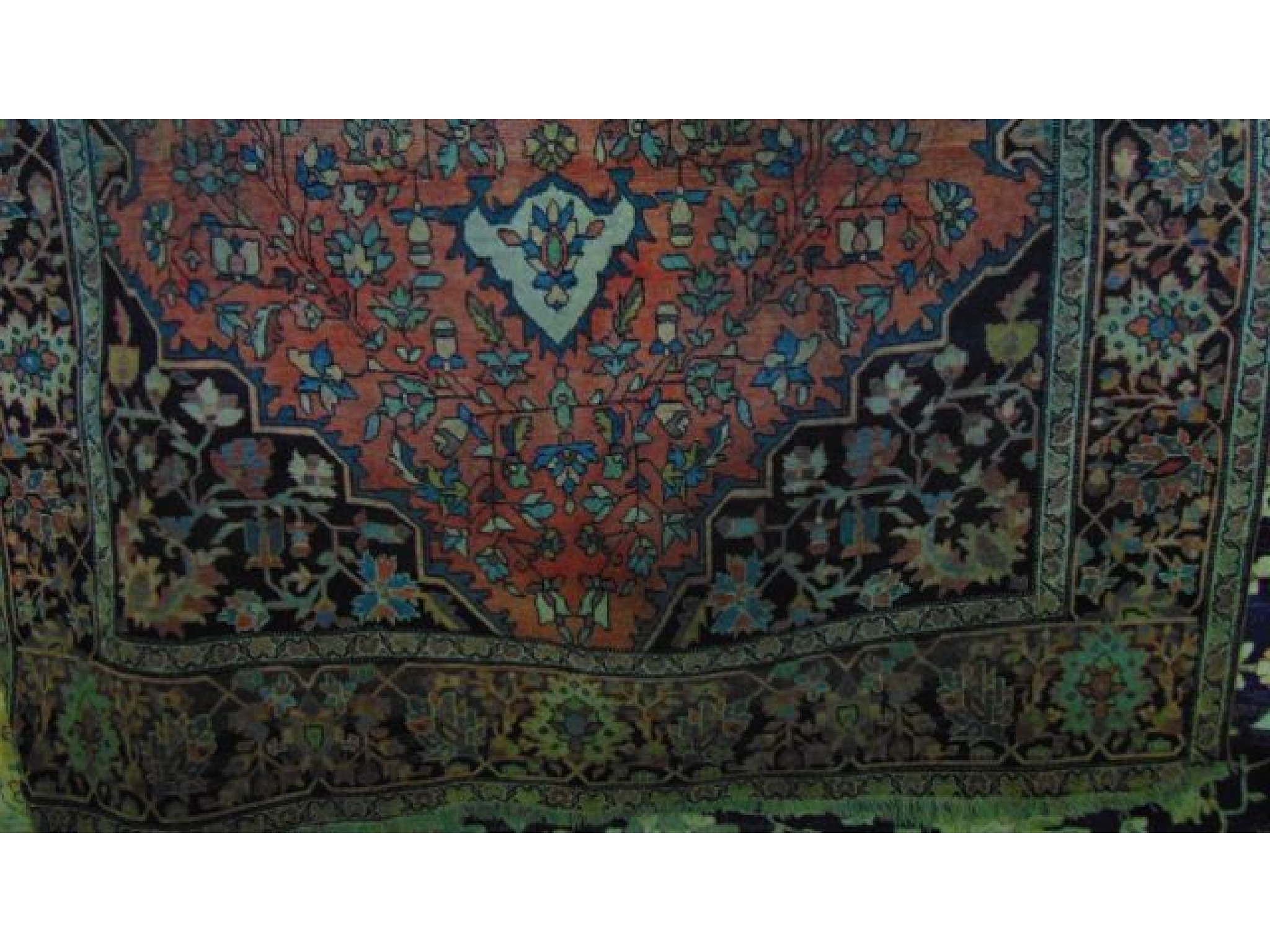 Appraisal: A Persian wool rug with pale pink field and abstract