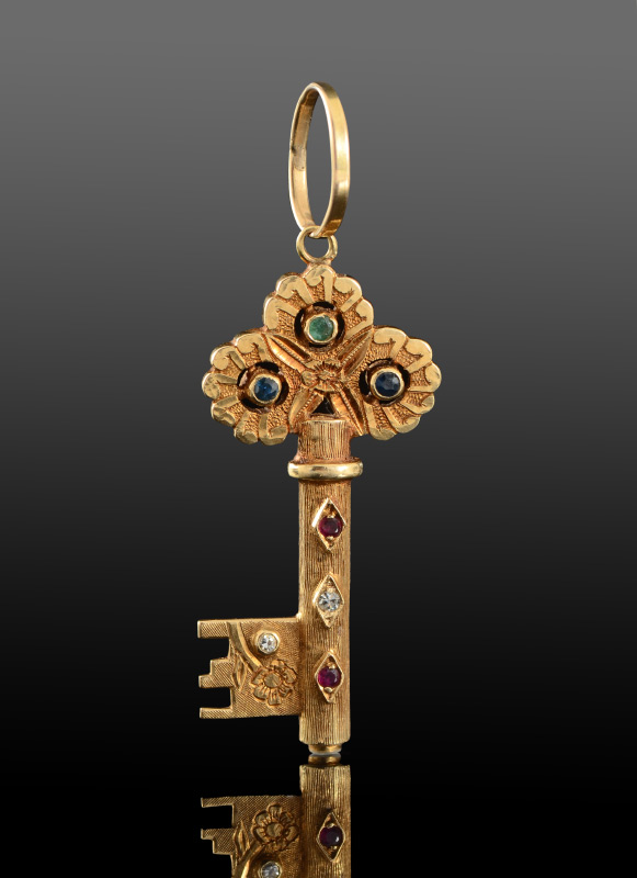 Appraisal: EARLY TH C GEMSTONE FIGURAL KEY PENDANT K yellow gold