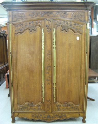 Appraisal: LOUIS XV CARVED OAK ARMOIRE French late th early th