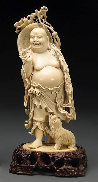 Appraisal: An ivory figural okimono th Century Well carved as Hotei