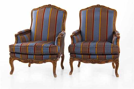 Appraisal: Pair Louis XV style fruitwood bergeres late th century padded