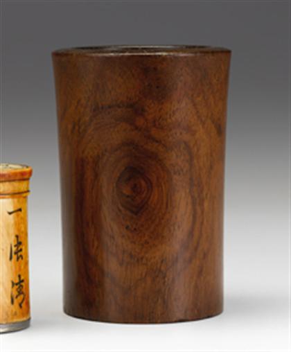 Appraisal: Small Chinese huanghuali brushpot th century Of single section cylindrical