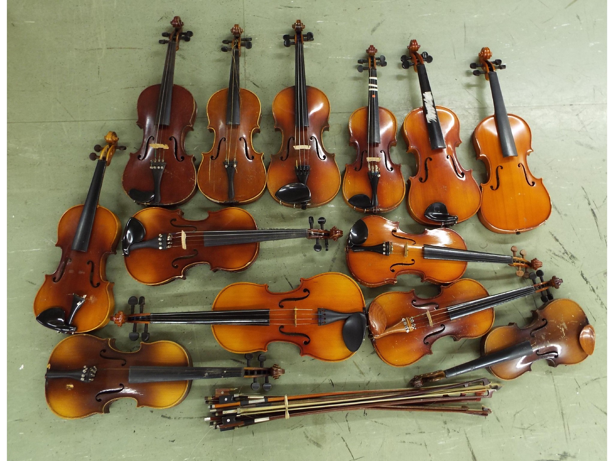 Appraisal: Viola and twelve various size contemporary violins also a small