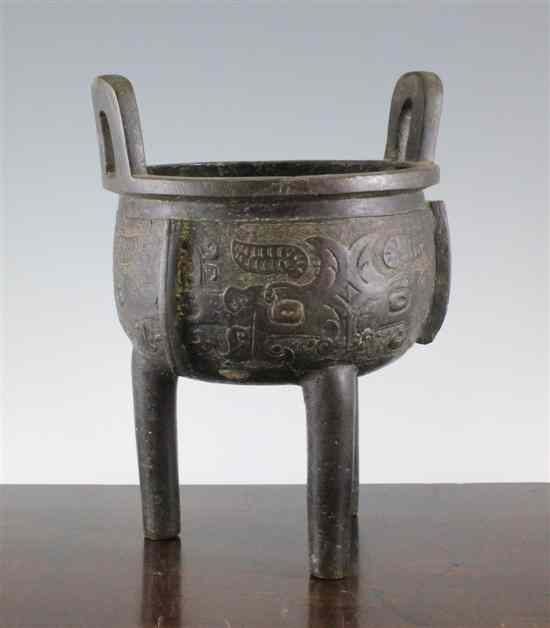 Appraisal: A large archaistic bronze tripod censer 'gui' Ming Dynasty th