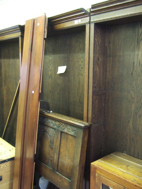 Appraisal: A th century oak floor standing open bookcase of three