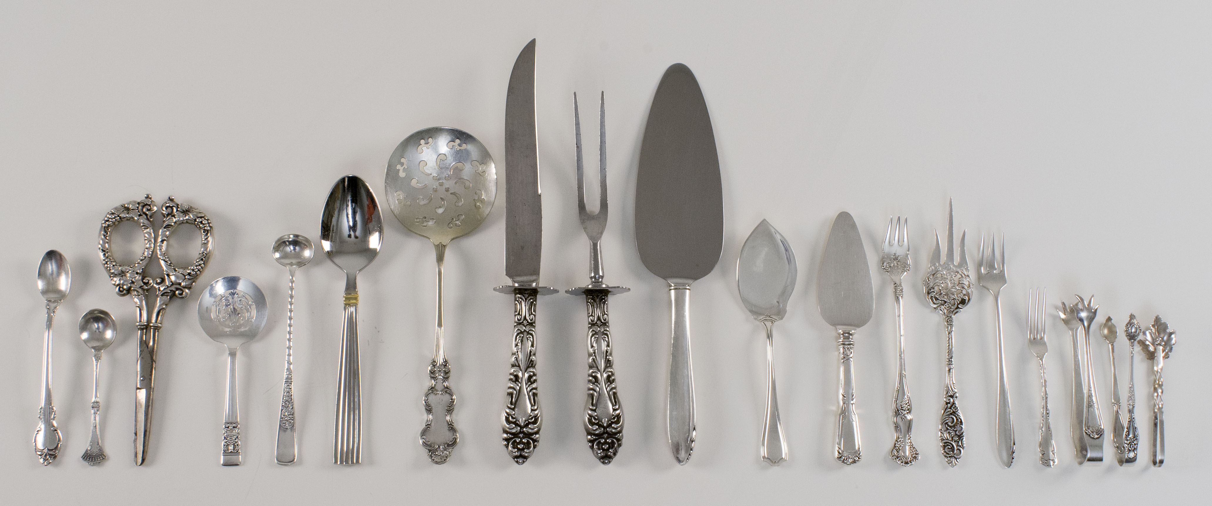 Appraisal: NINETEEN PIECES OF STERLING SILVER AND SILVER PLATED FLATWARE Nine