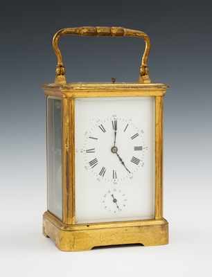 Appraisal: A French Brass Cased Carriage Clock With beveled glass front