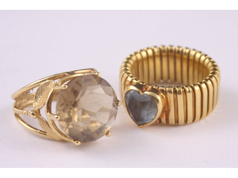 Appraisal: Two K Rings Aquamarine and Smokey Quartz yellow gold ring