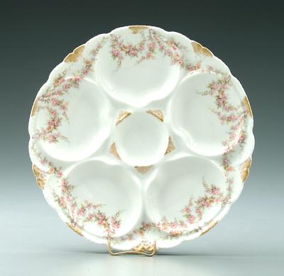 Appraisal: Eight Haviland oyster plates blossom and gilt decorated borders iron